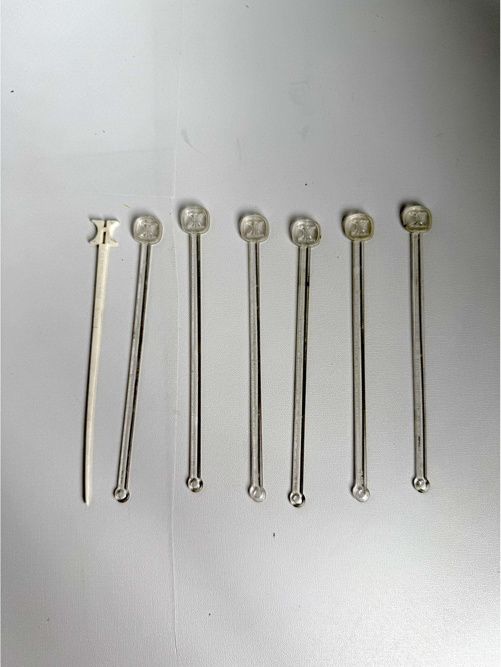 Set of 7 Vintage Clear Plastic Hilton Swizzle Sticks